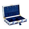 A luxury, velvet-lined jewellery box by Jonathan Adler with a blue geometric design