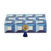 A luxury, velvet-lined jewellery box by Jonathan Adler with a blue geometric design