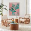 Jonathan Adler honey-toned rattan side table with glossy blue surface