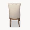 upholstered dining chair in beige with studding