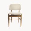 upholstered dining chair with curves and wood structuring