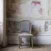 Decadent and elegant dining chair, upholstered in soft grey fabric