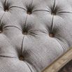 Wooden coffee table with grey upholstered table top