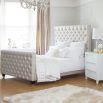 Luxury deep buttoned bed with silver studding and dark feet