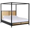 Elegant rattan and black four poster bed