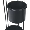 A sleek and chic plant stand with cascading heights and a black iron frame