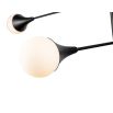 Svelte ceiling light with glass spheres suspended by sturdy arms