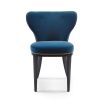 Deeply curved dining chair with studding and buttons