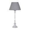 Tall and slim table lamp with shapely base and grey shade