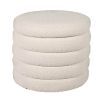 A luxurious boucle cream upholstered ottoman with storage space