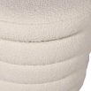 A luxurious boucle cream upholstered ottoman with storage space