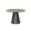 Round and tapered dining table with artisanal central leg