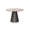 Round and tapered dining table with artisanal central leg