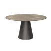 Round and tapered dining table with artisanal central table leg