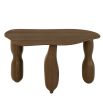 Sculptural console table crafted of mango wood with antique finish