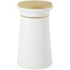 Tall side table with gold accents and striped gold design