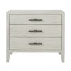 White washed three door bedside table with metal handles