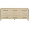 9 drawer chest of drawers in pale wood with curved silhouette