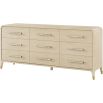 9 drawer chest of drawers in pale wood with curved silhouette