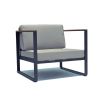 Industrial style armchair with bespoke fabric cushions and black metal frame with wooden armrests