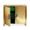 A dazzling, luxurious cabinet with a brass finish and natural malachite inlaid handles