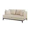 A modern sofa with a neutral linen upholstery and complementary scatter cushions