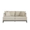 A modern sofa with a neutral linen upholstery and complementary scatter cushions