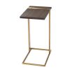 A luxury end table with a brushed brass base and walnut coloured table top