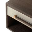 Elegant bedside table featuring drawer with brass details and shelf 