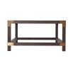 A stylish coffee table by Theodore Alexander with brushed brass corners