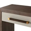 Elegant, modern console table with three drawers and brass accents