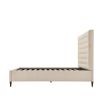 A sumptuous bed with a padded deep buttoned back and cream finish