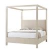 A contemporary four poster bed with a shagreen embossed leather wrapped body in a natural finish and nickel accents