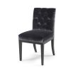 Classically shaped dining chair with deep buttoned features