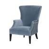 sky blue armchair with silver studding and black legs 