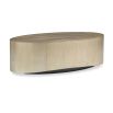 A statement coffee table by Caracole with an organic oval shape