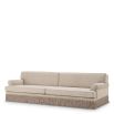 Cream sofa with twill detail surrounding the bottom