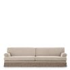 Cream sofa with twill detail surrounding the bottom