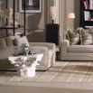 Large taupe armchair with a squared silhouette