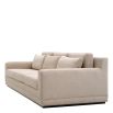 A sumptuous sofa with a luxury beige upholstery