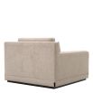 A sophisticated armchair with a luxury beige upholstery
