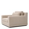 A sophisticated armchair with a luxury beige upholstery