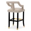 A contemporary bar stool with an 18th century French-inspired design