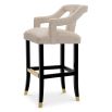 A contemporary bar stool with an 18th century French-inspired design