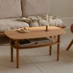 Elegant and concise coffee table with rattan shelf