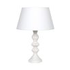 Shapely, distressed finish table lamp