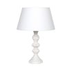 Shapely, distressed finish table lamp