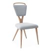 A stylish dining chair by Jonathan Adler with a unique design