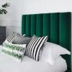 Art deco chic style bed with a towering deep fluted panel headboard 