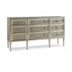 A sophisticated dresser by Caracole with jewellery-like hardware and nine spacious drawers